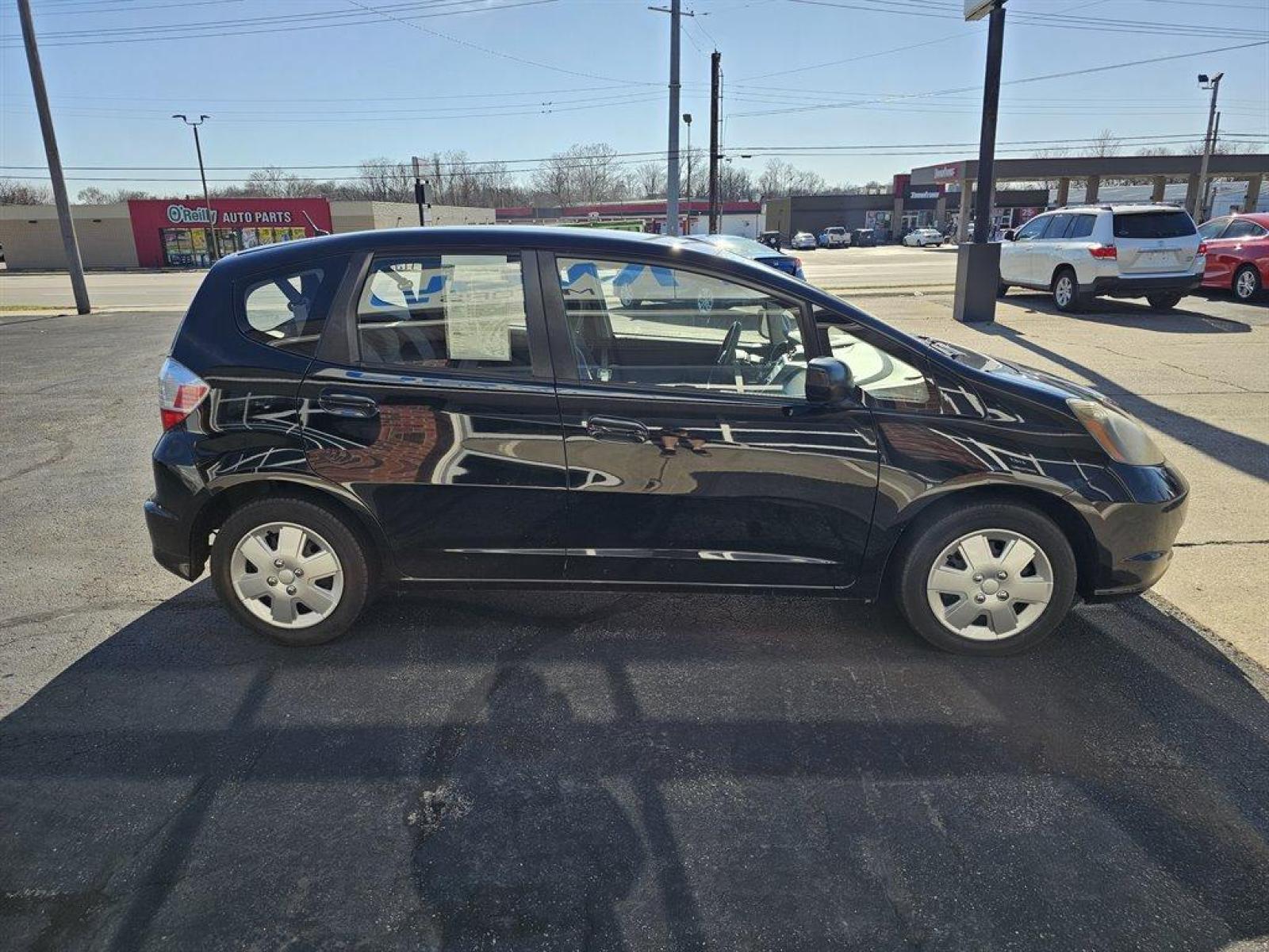 2011 Black /Black Honda Fit (JHMGE8H38BC) with an 1.5l I-4 MPI Sohc Vtec 1. engine, Auto transmission, located at 4163 Bardstown Rd, Louisville, KY, 40218, (502) 266-7677, 38.189991, -85.642418 - Photo #4