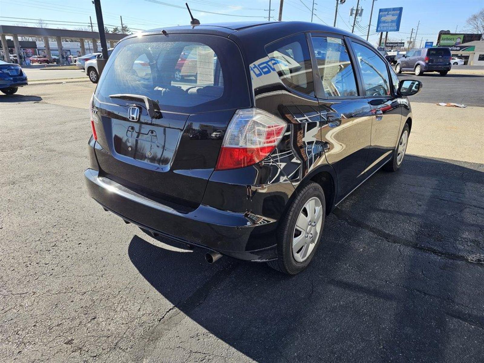 2011 Black /Black Honda Fit (JHMGE8H38BC) with an 1.5l I-4 MPI Sohc Vtec 1. engine, Auto transmission, located at 4163 Bardstown Rd, Louisville, KY, 40218, (502) 266-7677, 38.189991, -85.642418 - Photo #5