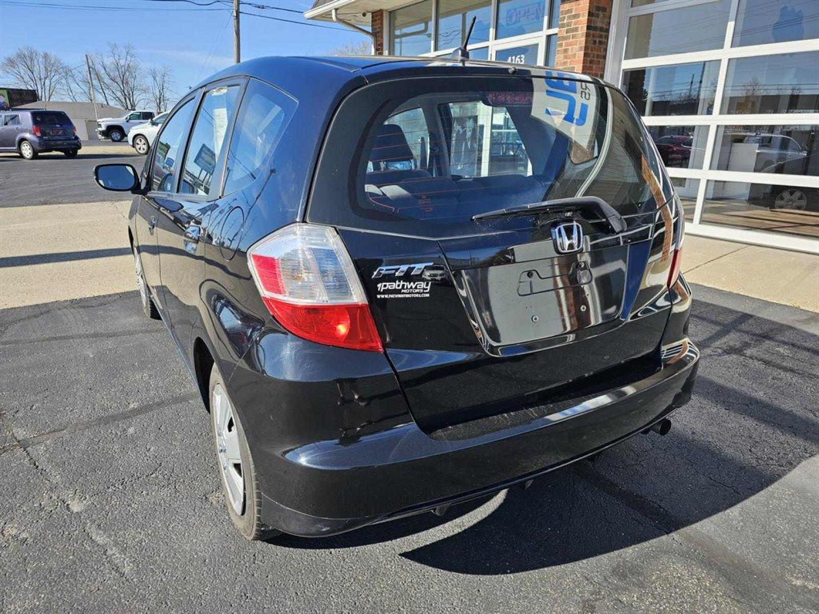 2011 Black /Black Honda Fit (JHMGE8H38BC) with an 1.5l I-4 MPI Sohc Vtec 1. engine, Auto transmission, located at 4163 Bardstown Rd, Louisville, KY, 40218, (502) 266-7677, 38.189991, -85.642418 - Photo #7
